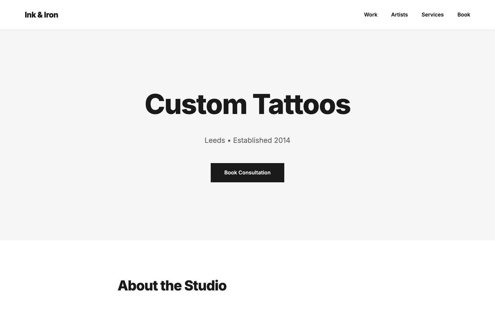 Tattoo studio website template for Ink & Iron with a bold Custom Tattoos headline